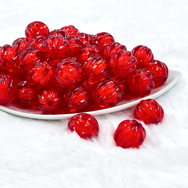 Front view of a pile of 20mm Red Transparent Pumpkin Shaped Bubblegum Beads