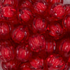 Close up view of a pile of 20mm Red Transparent Pumpkin Shaped Bubblegum Beads