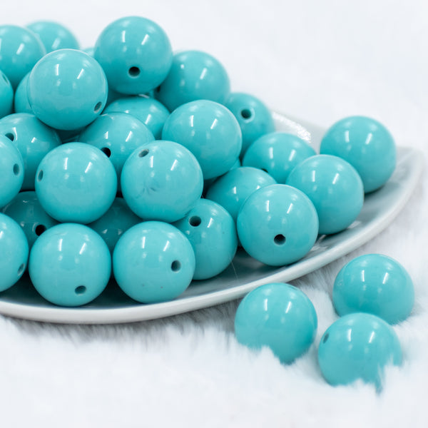 front view of a pile of 20mm Turquoise Blue Solid Chunky Bubblegum Beads