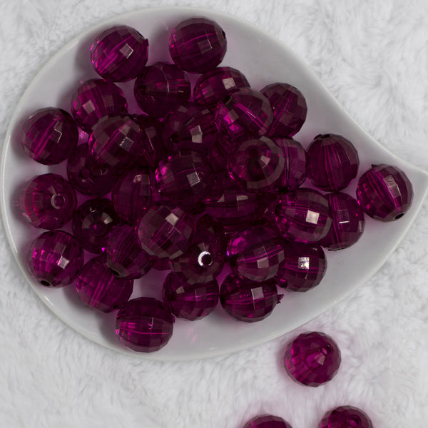 Top view of a pile of 20mm Violet Purple Transparent Disco Faceted Bubblegum Beads