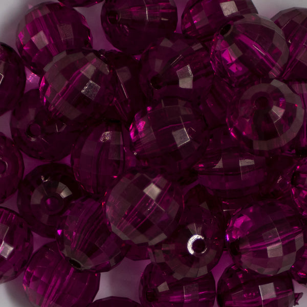 Close up view of a pile of 20mm Violet Purple Transparent Disco Faceted Bubblegum Beads