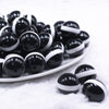 front view of a pile of 20mm White Band on Black Bubblegum Beads