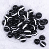 top view of a pile of 20mm White Band on Black Bubblegum Beads