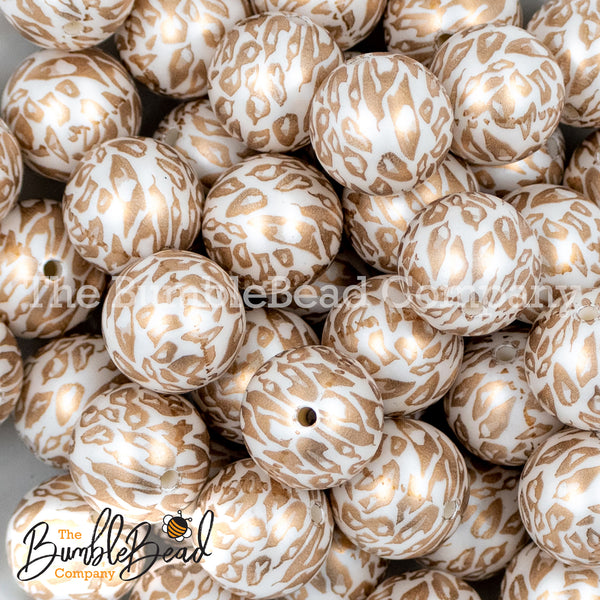 close up view of a pile of 20mm Gold Leopard Animal Print Acrylic Bubblegum Beads