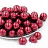 front view of a pile of 20mm Wine Red Faux Pearl Bubblegum Beads