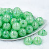 Front view of a pile of 20mm Winter Green Crackle AB Chunky Bubblegum Beads