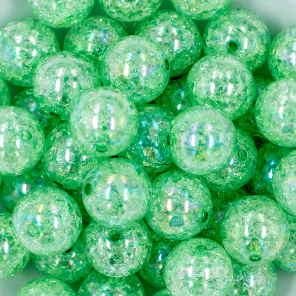 Close up view of a pile of 20mm Winter Green Crackle AB Chunky Bubblegum Beads
