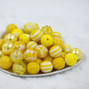 Front view of a pile of 20mm Yellow Submarine Chunky Acrylic Bubblegum Bead Mix [50 Count]