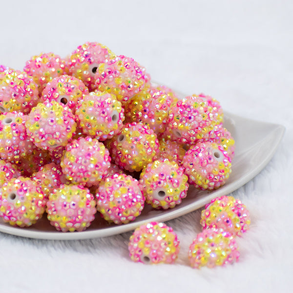front view of a pile of 20mm Yellow & Pink Confetti Rhinestone AB Bubblegum Beads