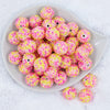 top view of a pile of 20mm Yellow & Pink Confetti Rhinestone AB Bubblegum Beads