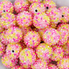 close up view of a pile of 20mm Yellow & Pink Confetti Rhinestone AB Bubblegum Beads