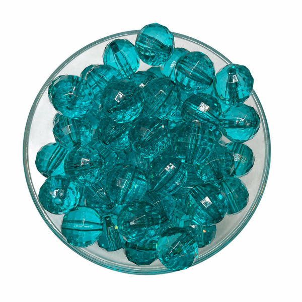 Top view of a pile of 24mm Aqua Blue Transparent Disco Faceted Pearl Chunky Bubblegum Beads