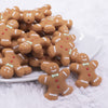 front view of a Gingerbread Man Silicone Focal Bead Accessory - 27mm x 30mm