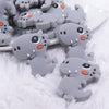 Front view of a Gray Dinosaur Silicone Focal Bead Accessory - 26mm x 33mm