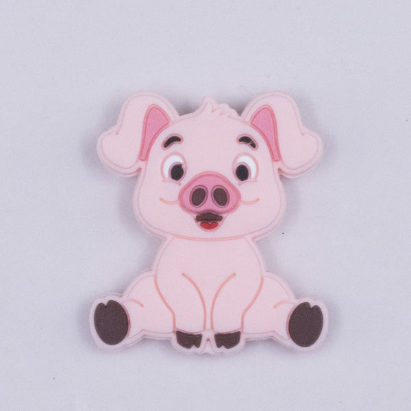 https://thebumblebeadcompany.com/cdn/shop/products/27mm-Pink-Pig-silicone-focal-bead-top_600x.jpg?v=1658880919
