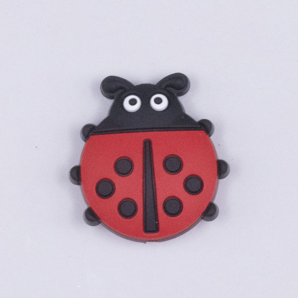 top view of a Ladybug Silicone Focal Bead Accessory - 27mm x 29mm
