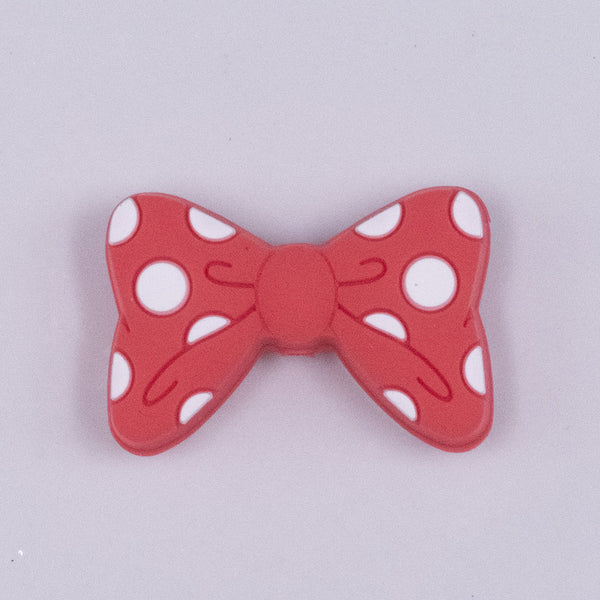 top view of a Bow Silicone Focal Bead Accessory - 28mm x 19mm