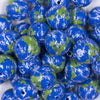 Close up view of a pile of 20mm Earth print acrylic bubblegum Beads