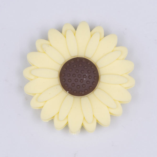 Top view of a Lt yellow 30mm silicone daisy flower beads