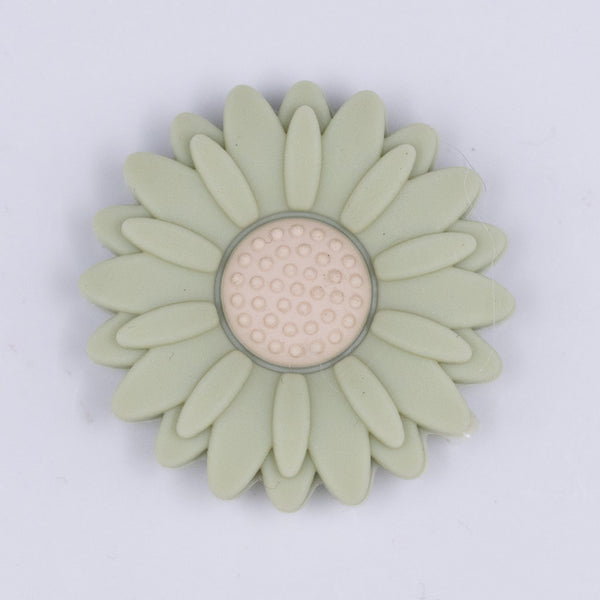 Top view of a green 30mm silicone daisy flower beads