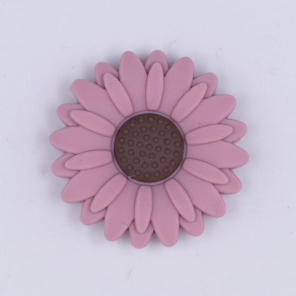 Top view of a Mauve Pink 30mm silicone daisy flower beads