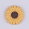 Top view of a mustard 30mm silicone daisy flower beads