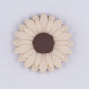 Top view of a cream 30mm silicone daisy flower beads