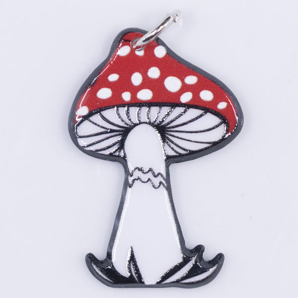 front view of a pile of Red & White Mushroom pendant with hoop 35x23mm