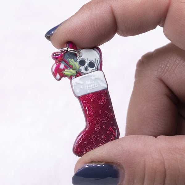 front view of a pile of Stocking Christmas Pendant with Skull and with hoop 40x20mm