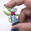 front view of a Christmas Bell with Holly and Skull Pendant with hoop 31x42mm
