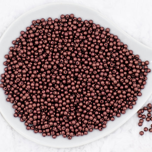 Top view of a pile of 4mm Brown Pearl Spacer Beads [100-120 Count]