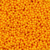 Close up view of a pile of 4mm Mustard Yellow Pearl Spacer Beads [100-120 Count]