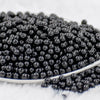 front view of a pile of 6mm Black Pearl Spacer Beads