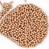 top view of a pile of 6mm Champagne Gold Pearl Spacer Beads