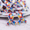 close up view of a pile of Autism Awareness Ribbon Silicone Focal Bead Accessory