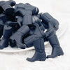 front view of a pile of Black Cowboy Boot Silicone Focal Bead Accessory - 30mm x 26mm