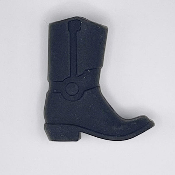 top view of a pile of Black Cowboy Boot Silicone Focal Bead Accessory - 30mm x 26mm