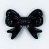 Top view of Black Acrylic Bows Pendants for chunky bubblegum bead creations - 46mm