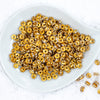 top view of a pile of 8mm Gold Rondelle Spacer Beads [Set of 20]