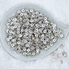 top view of a pile of 8mm Silver Rondelle Spacer Beads [Set of 20]