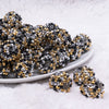 front view of a pile of 20mm Gold, Silver and Black Confetti Rhinestone AB Acrylic Bubblegum Beads
