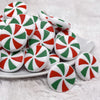 front view of a pile of Red and Green Peppermint Candy Silicone Focal Bead Accessory - 28mm x 28mm