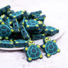 front view of a pile of Turtle Silicone Focal Bead Accessory