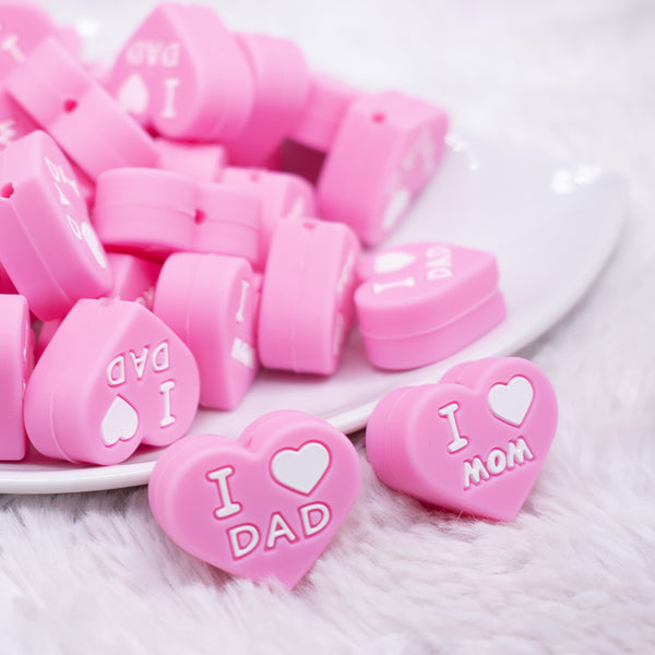 front view of I Love Mom / Dad Pink Heart Silicone Focal Bead Accessory