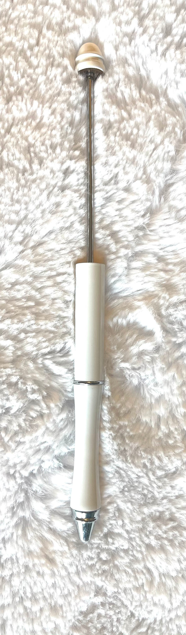 top view of a white metal beadable pen