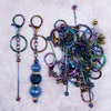 top view of a pile of Neochrome Beadable Keychain - 1 & 5 Count