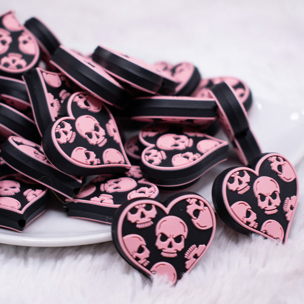 Front view of Black heart with Pink Skull Silicone Focal Bead Accessory