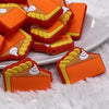 Front view of a  pile of Pumpkin Pie Silicone Focal Bead Accessory - 28mm x 30mm
