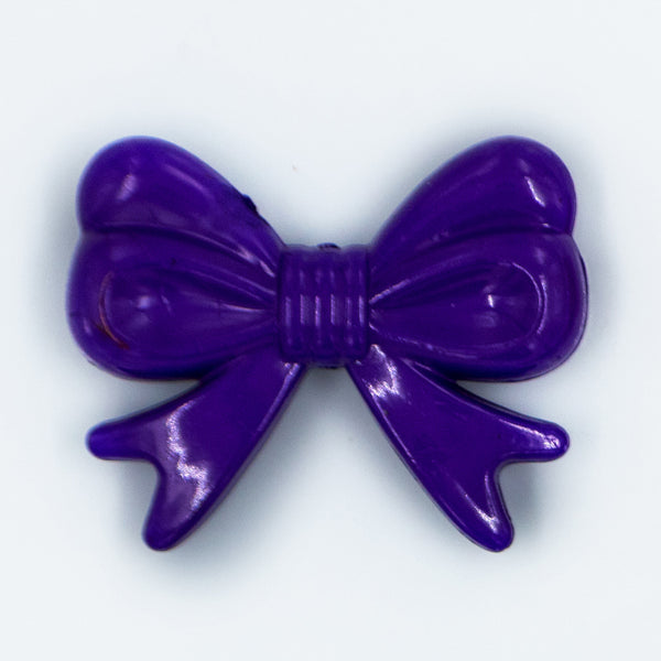 Top view of Purple Acrylic Bows Pendants for chunky bubblegum bead creations - 46mm