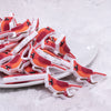 Front view of a pile of Red Cardinal Silicone Focal Bead Accessory